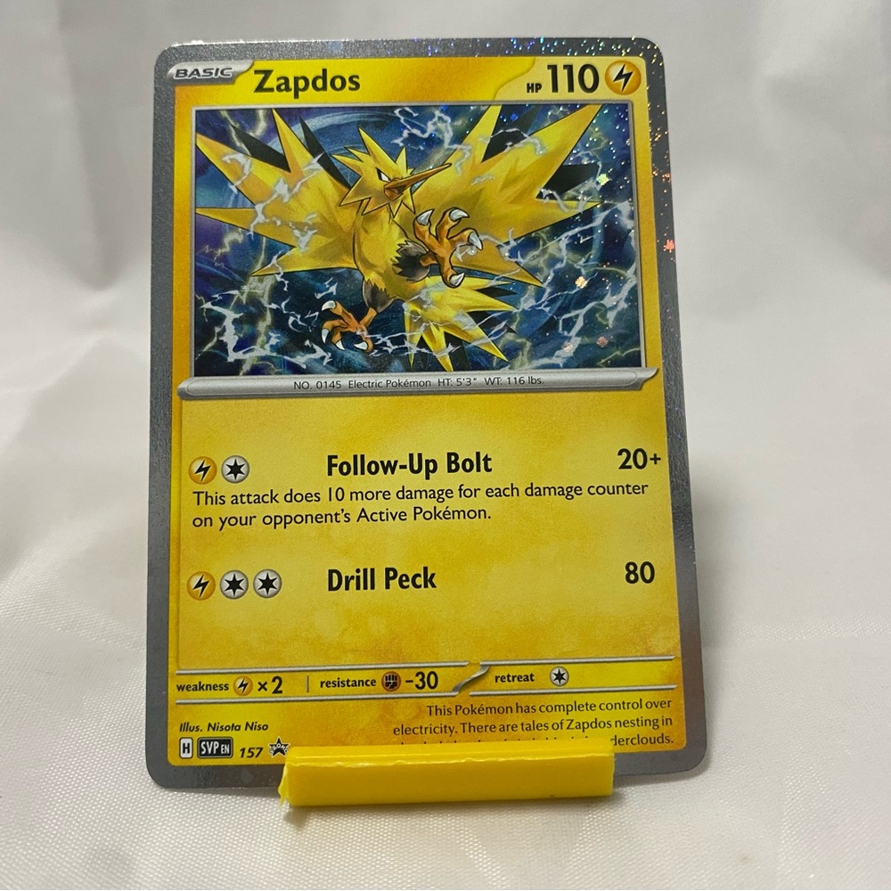 Pokemon TCG Card Zapdos SVP 157 Surging Sparks Cosmo Holo Black Star Promo NM
